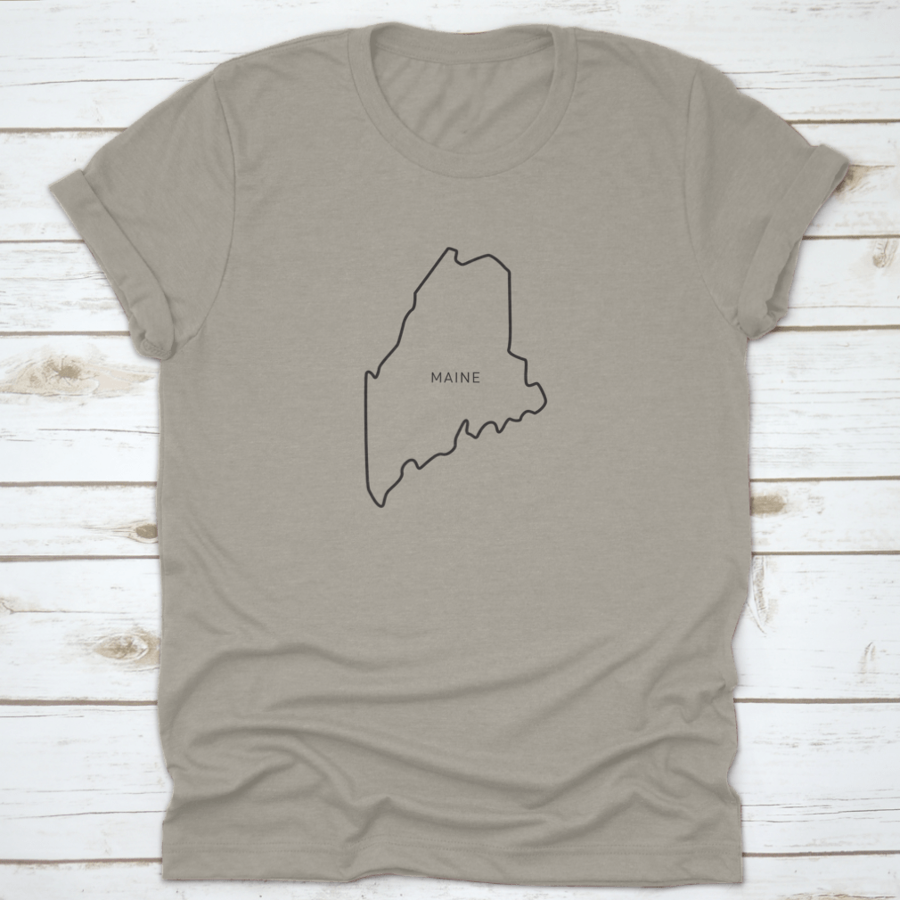 A stylish t-shirt featuring a simple typography outline of the state of Maine, made from high-quality cotton fabric.